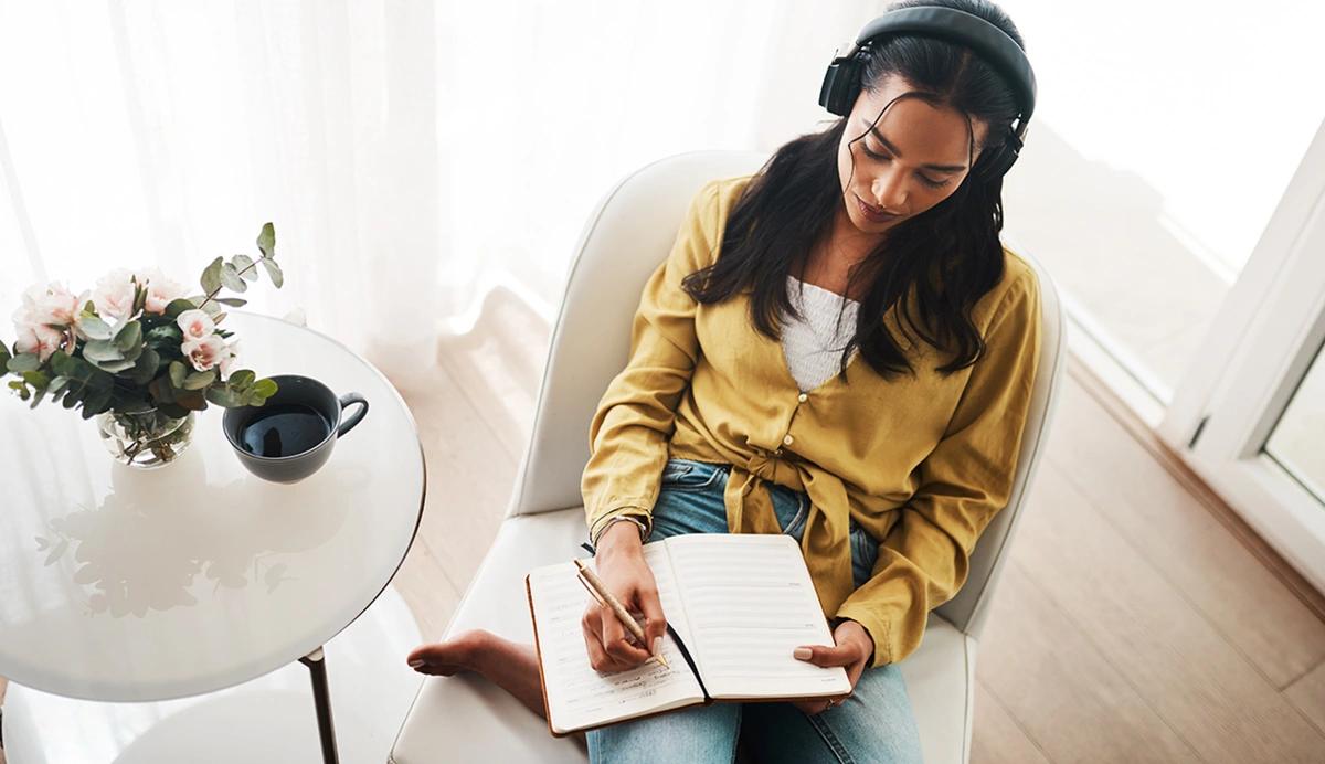 woman sitting with notebook